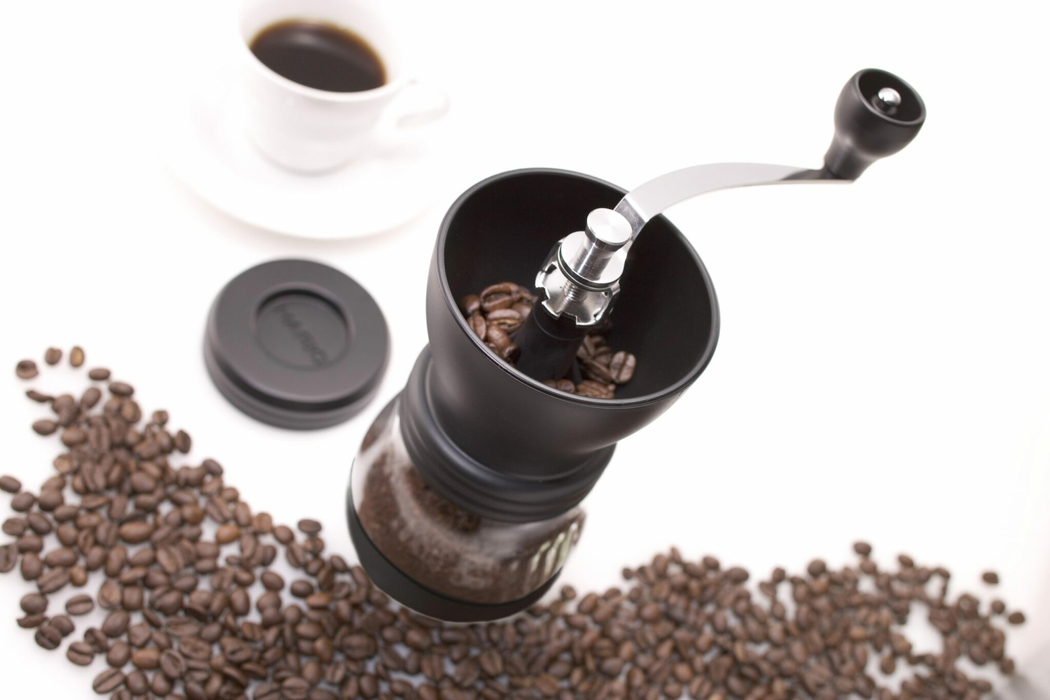 Помол зерна кофе. Кофемолка Hario MSCS-2tb. Кофемолка ручная Coffee Grinder. Кофе гриндер кофемолка. Грайндер Hario.
