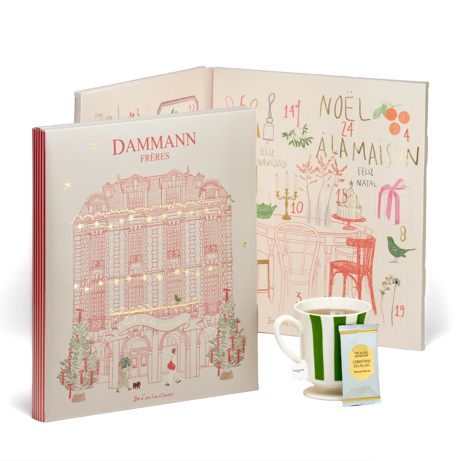 Calendrier de l'Avent Dammann Frères avec illustration d'un immeuble haussmannien, accompagné d'une tasse et d'un sachet de thé de Noël