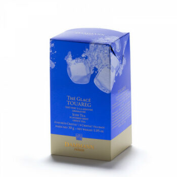 Boîte de thé glacé Dammann Frères Menthe Touareg 30g, design bleu profond avec glaçons et éclaboussures d'eau