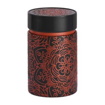 Boîte à thé Eigenart ronde en inox noir, design Mandala Ebony avec motifs floraux cuivrés en relief, couvercle hermétique
