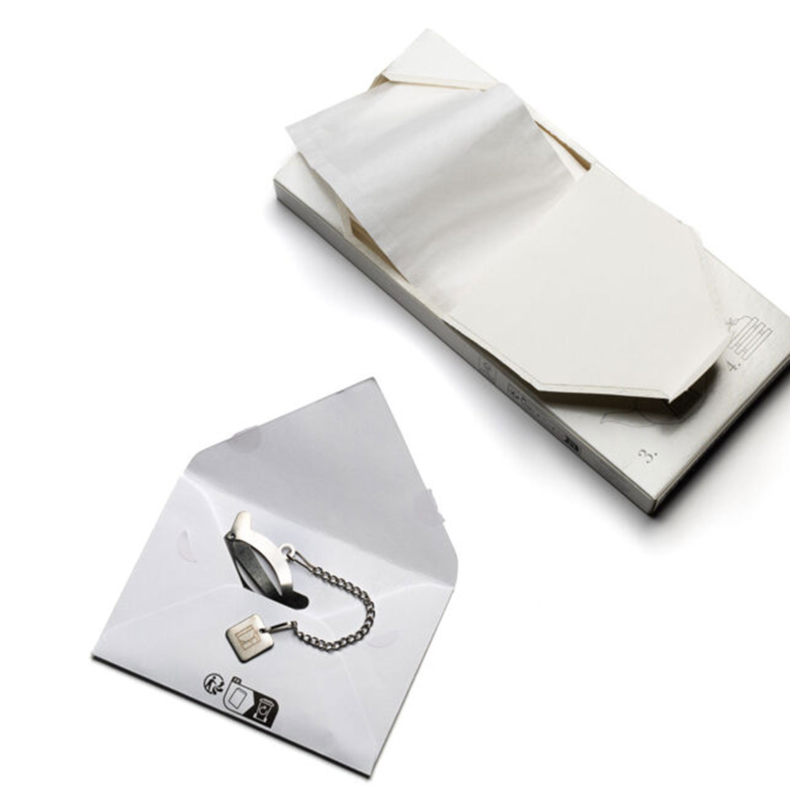 Boîte de 60 filtres à thé Dammann Frères et une pince en inox en forme de théière, pour une infusion parfaite