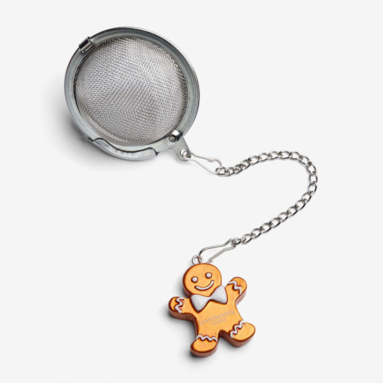 Boule à thé Dammann Frères en acier inoxydable avec un charmant pendentif en forme de bonhomme de pain d'épice souriant