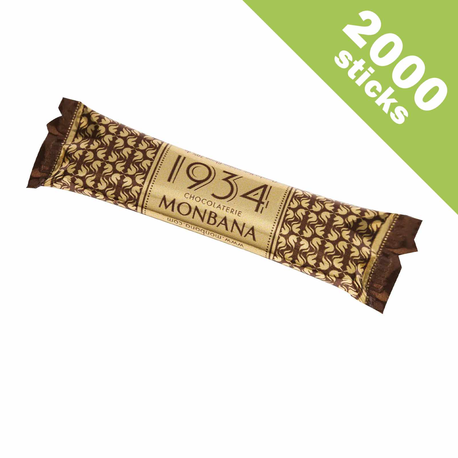 Un stick de chocolat noir Monbana 1934, emballage doré avec motifs marron, 70% cacao, origine Ghana