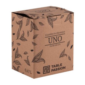 Boîte en carton brun avec motif de feuilles stylisées, indiquant 'Tisanière en céramique UNO Filtre inclus' et 'Table Passion', capacité 0,47L