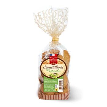 Sachet transparent de Biscuiterie du Quercy Croustillants pistache 175g, biscuits dorés parsemés de pistaches, sur fond rayé rouge et blanc