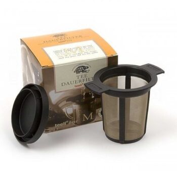 Filtre à thé permanent Teeli taille M avec son couvercle égouttoir, présenté à côté de sa boîte d'emballage