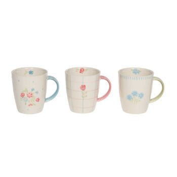 Trois mugs Amadeus Juliette en grès émaillé, motifs floraux et anses colorées, sur fond blanc