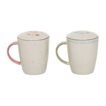 Deux tisanières Amadeus Juliette en grès blanc, l'une avec un motif de petites fleurs roses et bleues et une anse rose, l'autre avec des rayures bleues et des fleurs bleues et une anse verte.