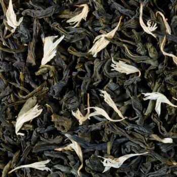 Thé vert de Chine séché parsemé de pétales de fleurs blanches, arôme de pistache et fleur d'oranger