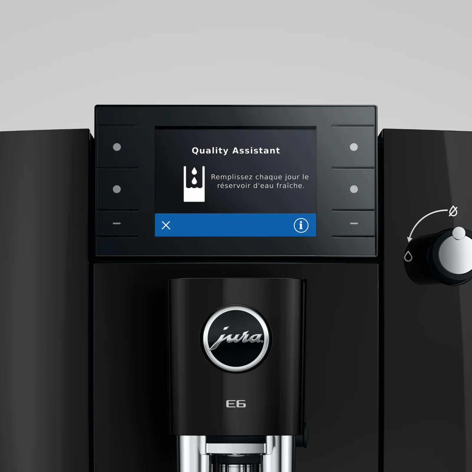 Écran de la machine à café Jura E6 affichant le message Quality Assistant demandant de remplir le réservoir d'eau fraîche au quotidien