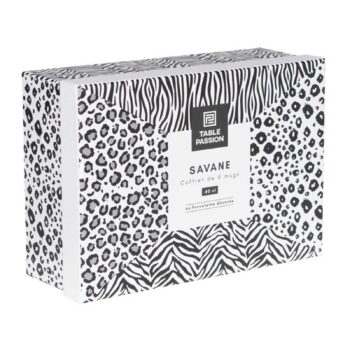Coffret cadeau de quatre mugs en porcelaine décorée Savane, avec un motif mixant taches de léopard et rayures de zèbre dans un emballage blanc.