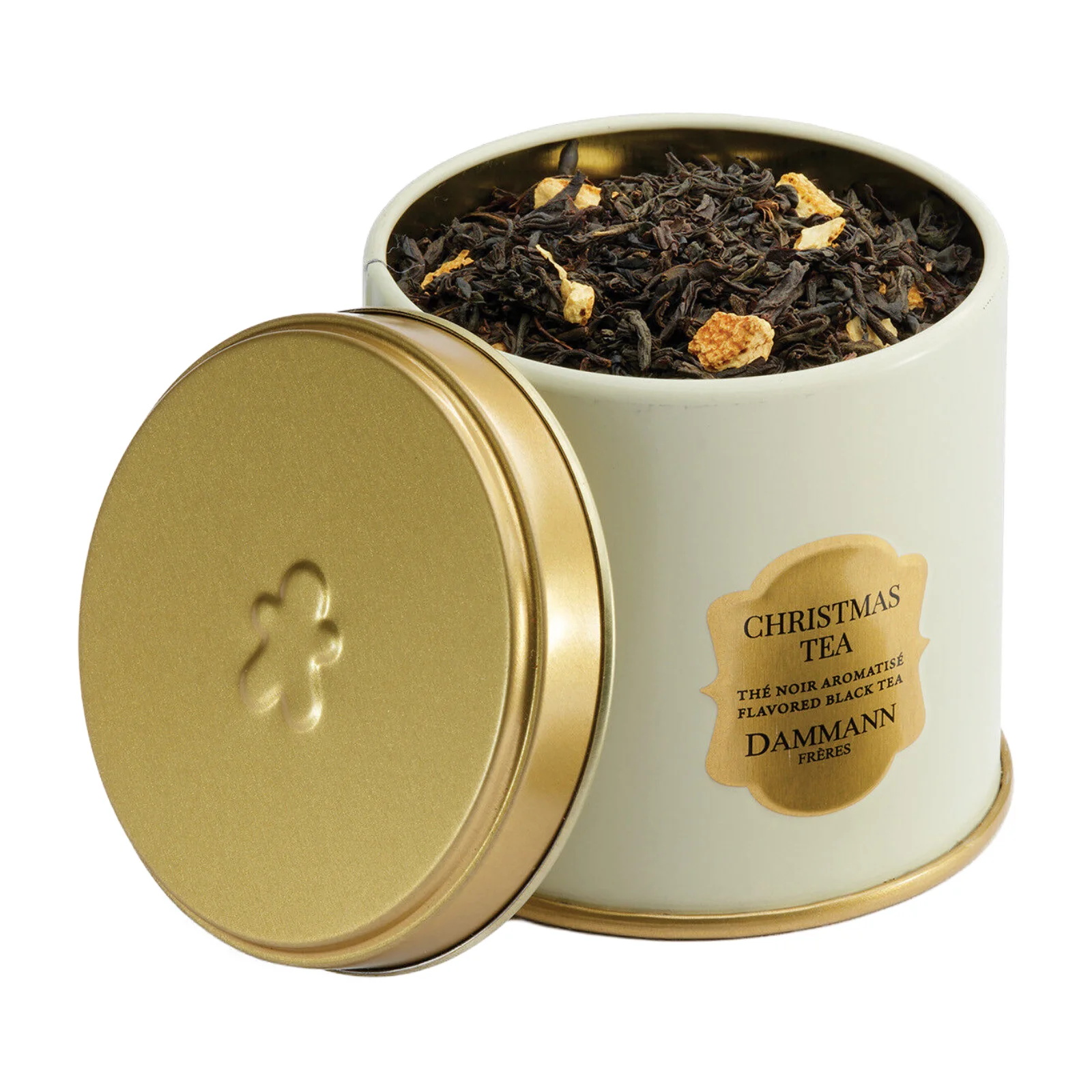 Boîte métallique de thé noir Dammann Frères avec couvercle doré orné d'un biscuit en relief, remplie de feuilles de thé Christmas Tea aux fruits