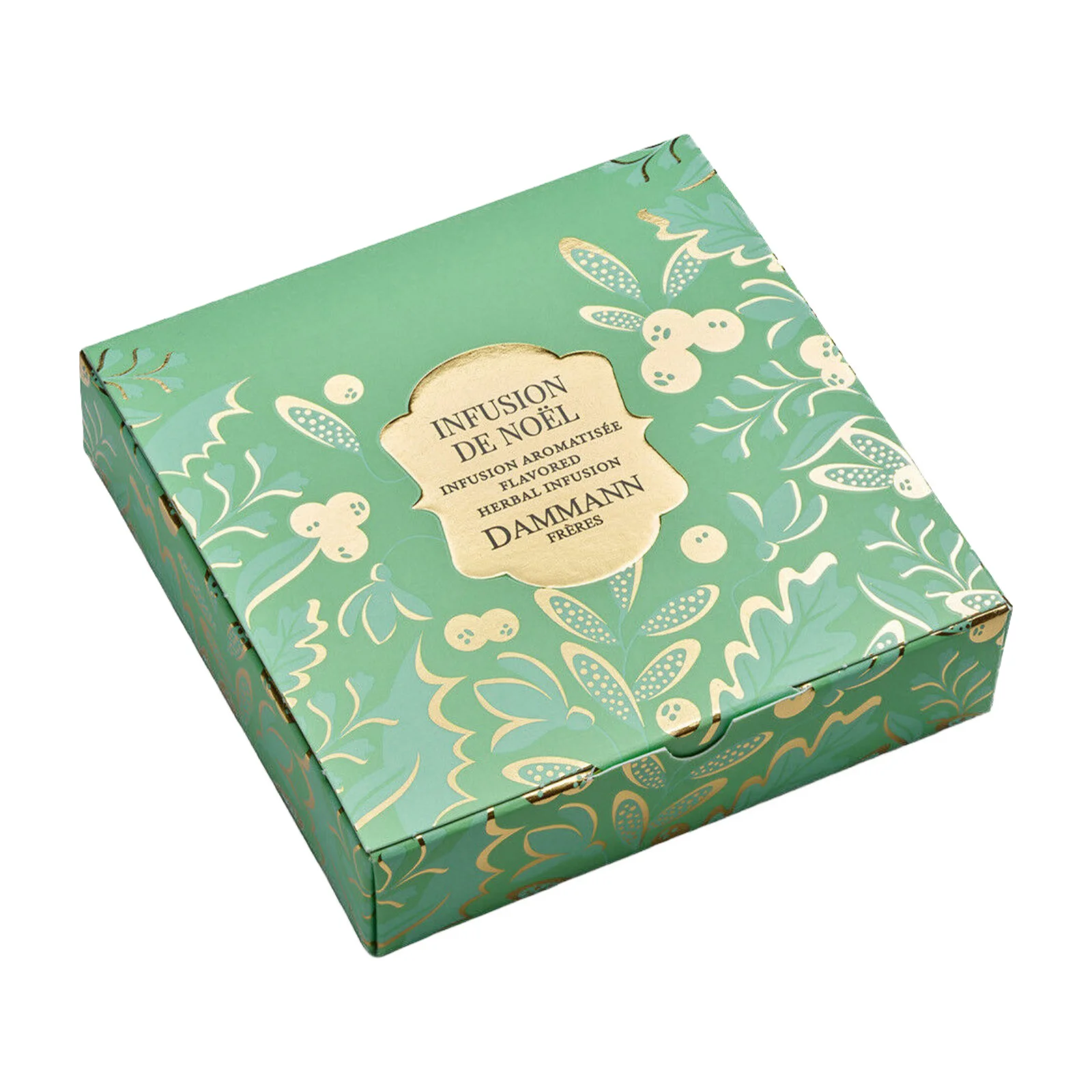 Boîte carrée d'Infusion de Noël Dammann Frères avec un motif végétal vert et doré, packaging élégant pour tisane de fêtes