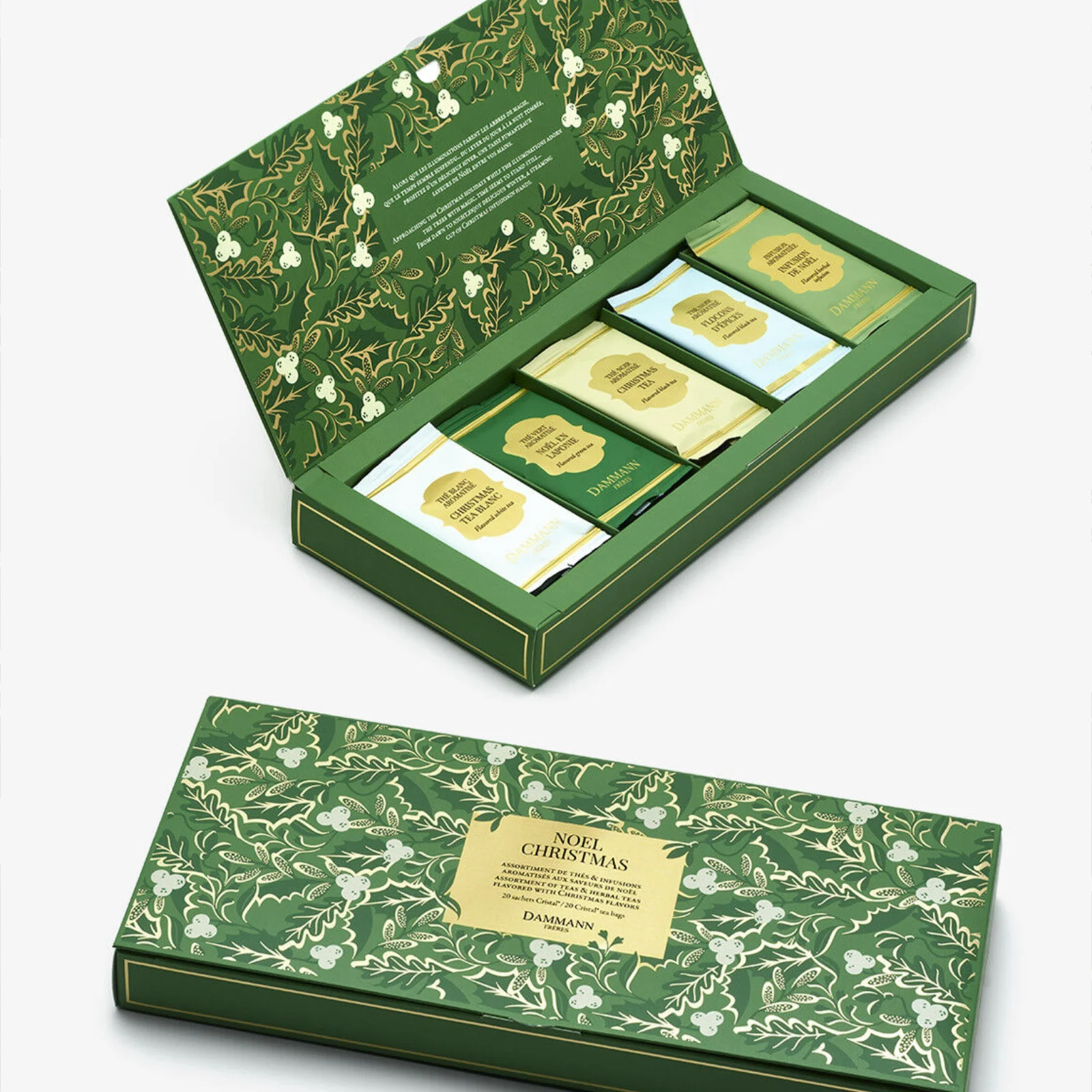 Coffret cadeau Dammann Frères Noel, contenant vingt sachets de thés et infusions variés dans une boîte en carton vert ornée de motifs végétaux dorés