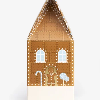 Boîte cadeau en forme de maison en pain d'épices avec des fenêtres, un bonhomme en pain d'épices, une canne à sucre et des sucettes dessinées