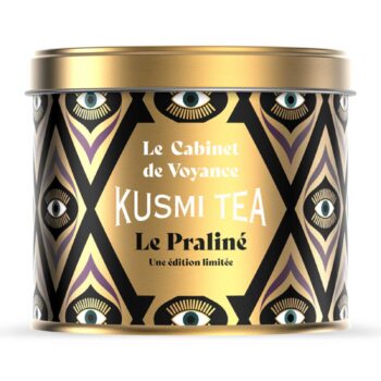 Boîte ronde en métal Kusmi Tea Le Praliné, édition limitée dorée aux motifs mystiques noirs et violets, 95 g.