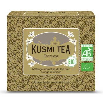 Boîte Kusmi Tea Tsarevna Bio, motif floral doré et beige sur fond moutarde, 20 sachets mousseline, label AB